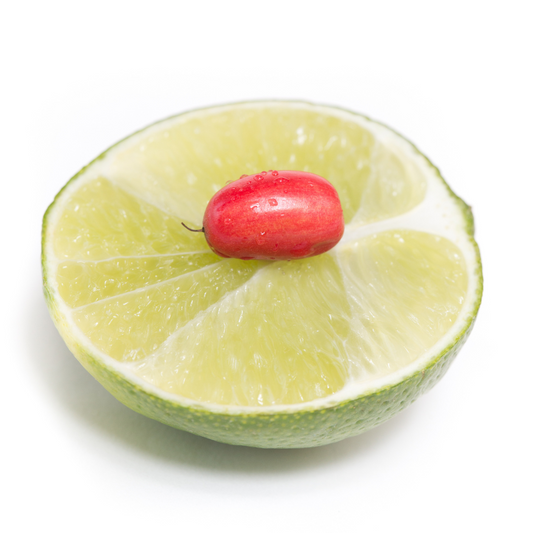 fresh miracle berry on a lime with water droplets