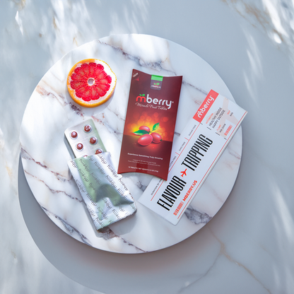 mberry miracle fruit tablets on marble table with flavor tripping flyer